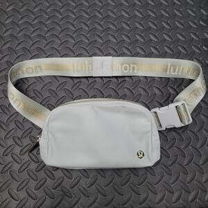 Lululemon Everywhere Belt Bag Light Gray Gold Logo Adjustable